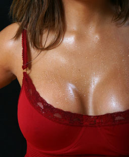 http://www.sweatinghelp.info/images/female-with-sweating-chest.jpg